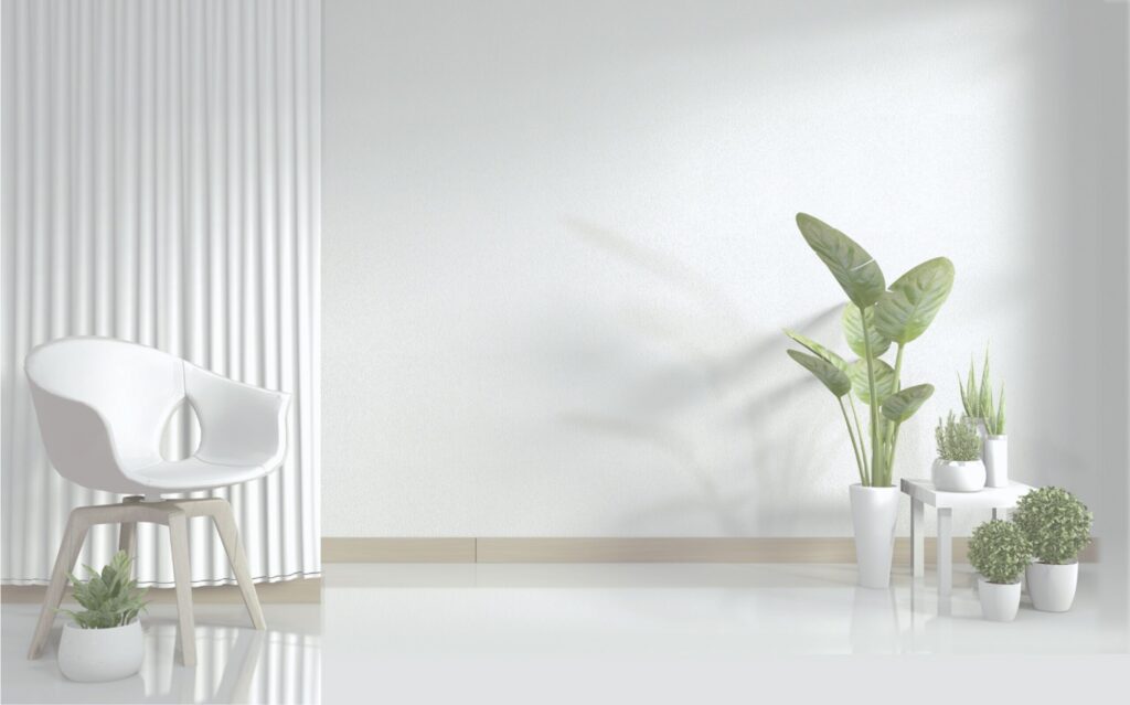 木目の床に置かれたシンプルなオフィスデスク